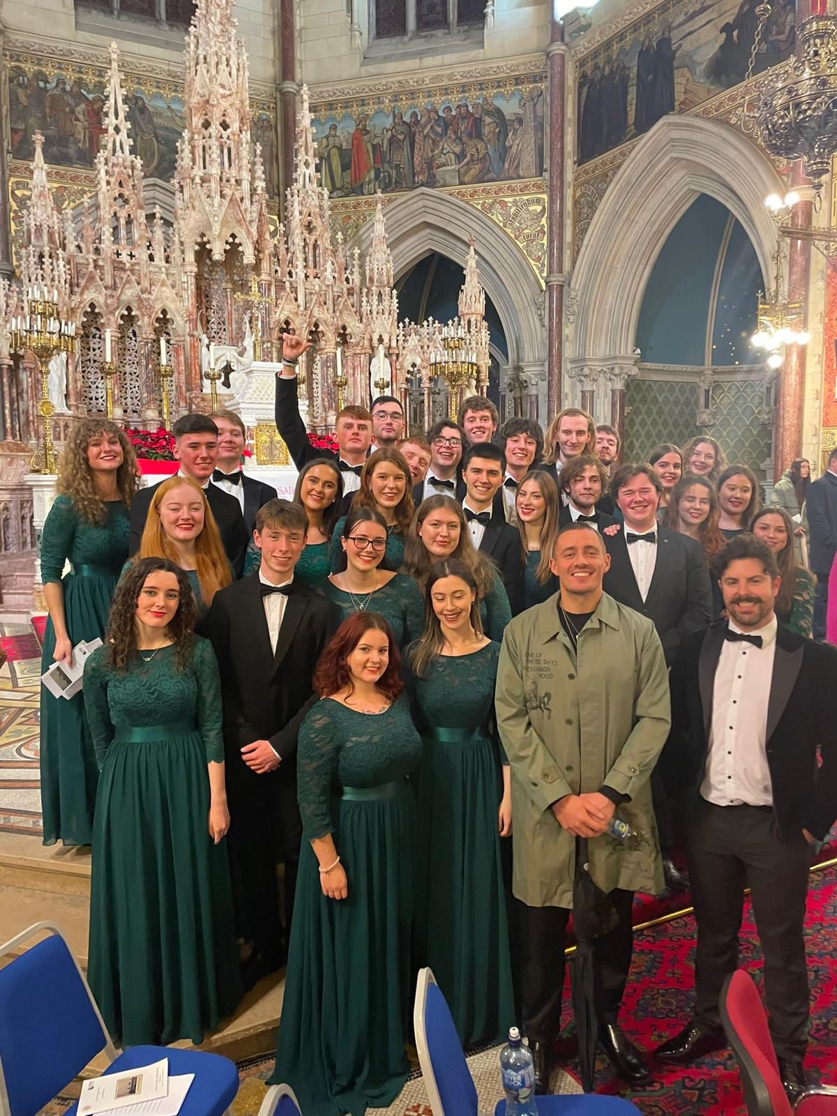 Tyler Wallin with a chamber choir